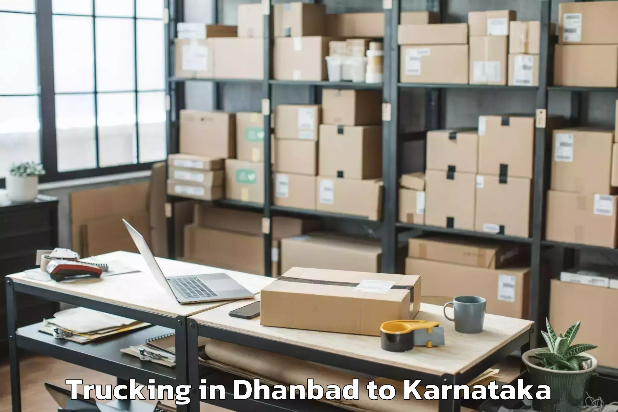 Reliable Dhanbad to Karnataka State Law University Trucking